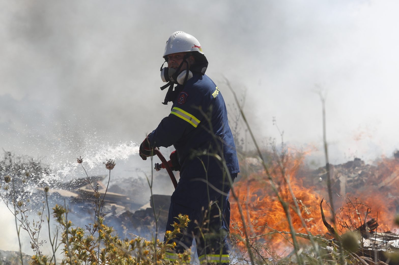 Wildfire Near Greek Capital Under Control, Firefighters Continue Efforts